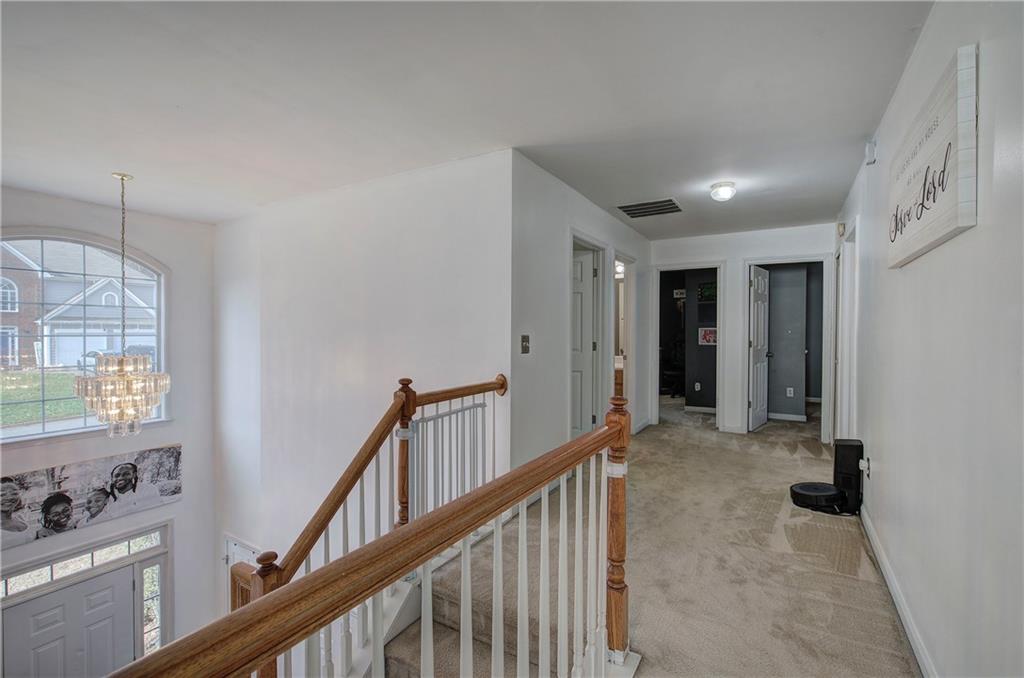 4508 Howell Farms Road Northwest Acworth, GA 30101 - Photo 26 of 42 a view of a hallway with windows