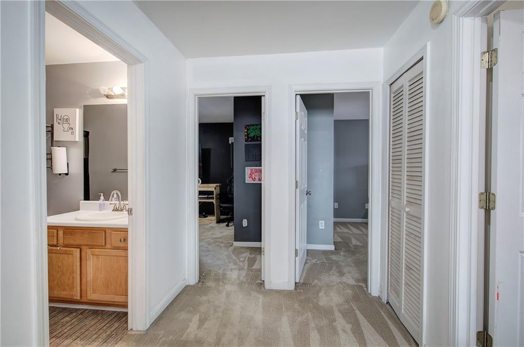 4508 Howell Farms Road Northwest Acworth, GA 30101 - Photo 27 of 42 a view of hallway with bathroom and wooden floor