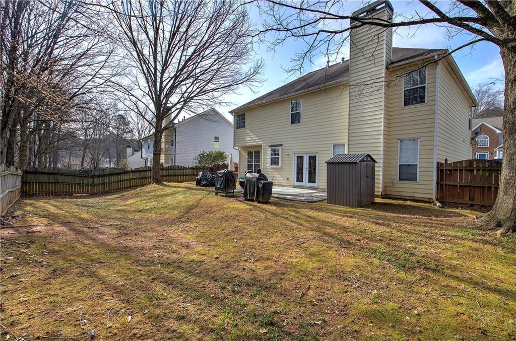 4508 Howell Farms Road Northwest Acworth, GA 30101 - Photo 37 of 42 a view of a yard with a large tree