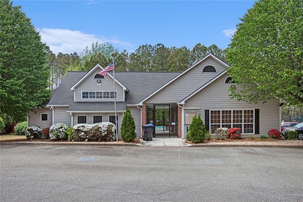 4508 Howell Farms Road Northwest Acworth, GA 30101 - Photo 41 of 42 a front view of a house with a yard and potted plants