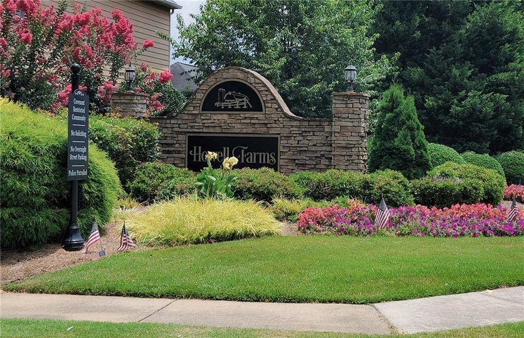 4508 Howell Farms Road Northwest Acworth, GA 30101 - Photo 42 of 42 a front view of a house with a garden
