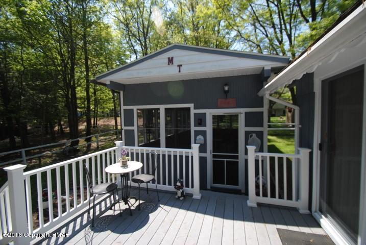 90 Highridge Road Albrightsville, PA 18210 - Photo 19 of 30 a view of a chair and table in the balcony
