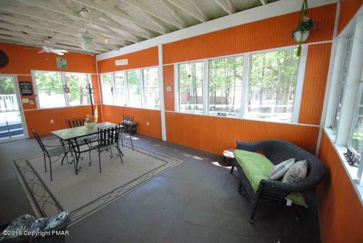 90 Highridge Road Albrightsville, PA 18210 - Photo 22 of 30 a outdoor sitting area with furniture and wooden floor