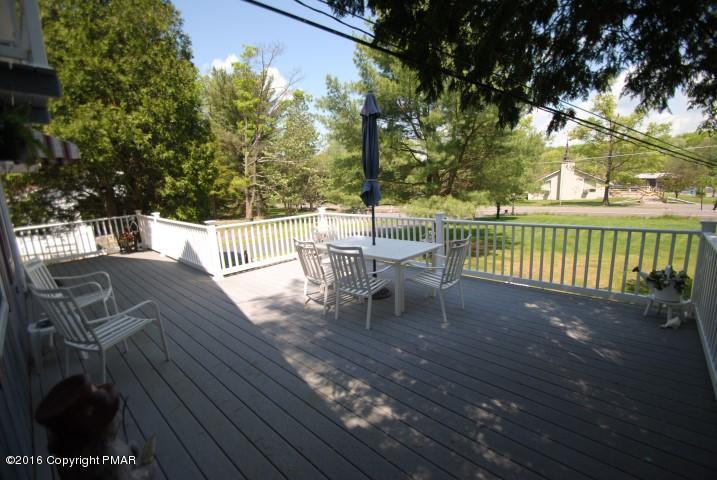 90 Highridge Road Albrightsville, PA 18210 - Photo 24 of 30 a view of a patio with a table chairs and a potted plant