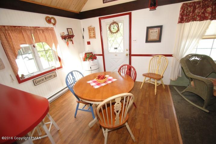 90 Highridge Road Albrightsville, PA 18210 - Photo 4 of 30 a view of a dining room with furniture and wooden floor