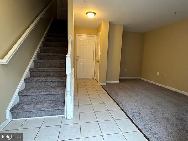 a view of entryway with stairs