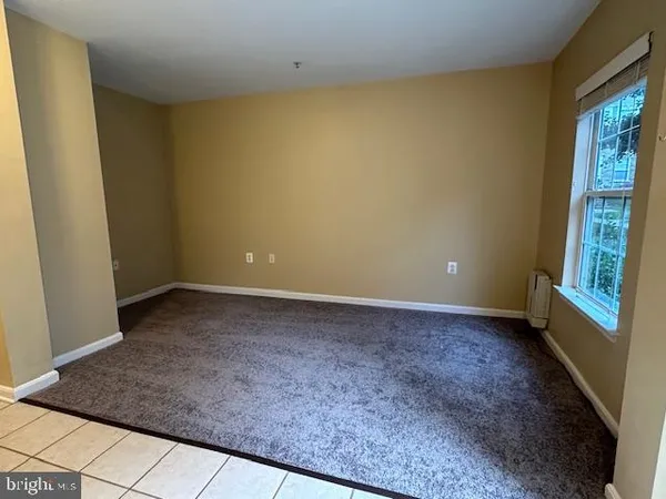 a view of a room with a window