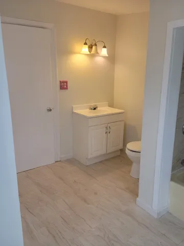 a view of bathroom with a sink and a toilet