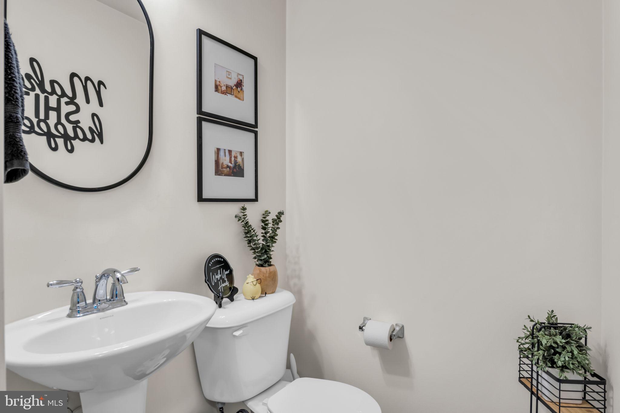 100 Eagle Road Dillsburg, PA 17019 - Photo 33 of 45 a bathroom with a toilet a sink and mirror