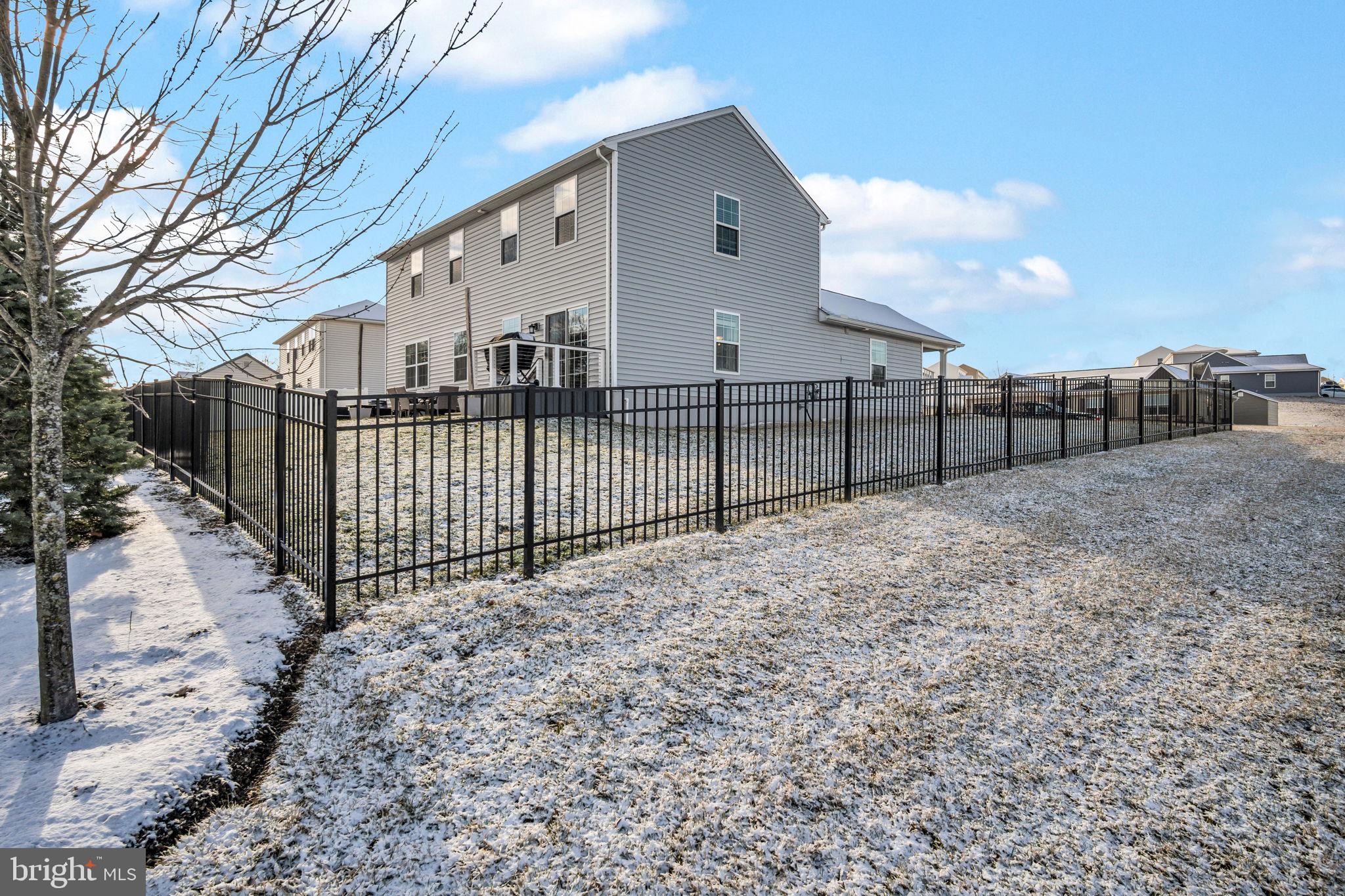 100 Eagle Road Dillsburg, PA 17019 - Photo 42 of 45 a view of a backyard with wooden fence and a bench