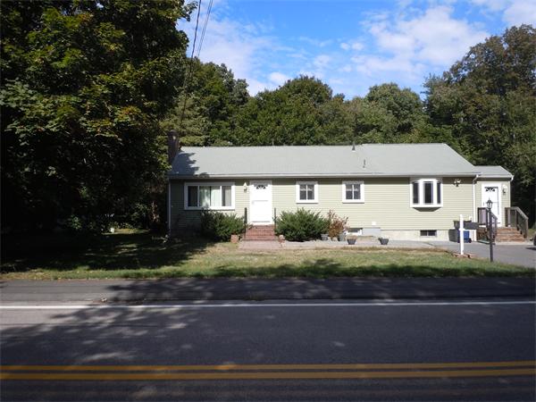 22 Lyndon Road Sharon, MA 02067 - Photo 1 of 15 a aerial view of a house next to a yard