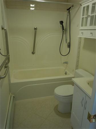 22 Lyndon Road Sharon, MA 02067 - Photo 11 of 15 a bathroom with a shower a toilet and a sink