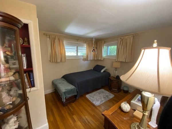 76 Woodledge Road Needham, MA 02492 - Photo 11 of 12 a living room with furniture and a window