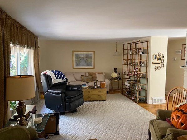 76 Woodledge Road Needham, MA 02492 - Photo 7 of 12 a bedroom with furniture and a window