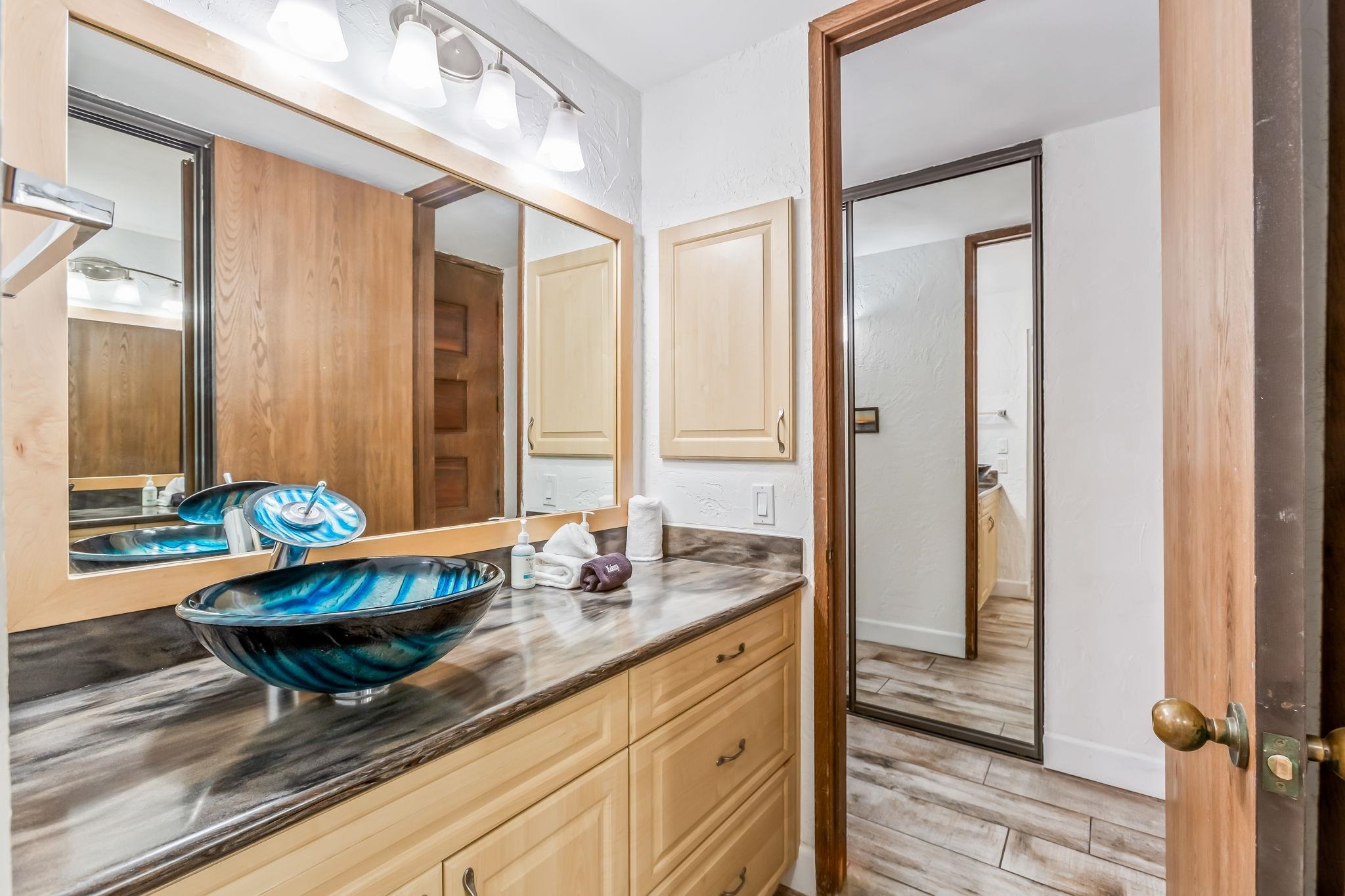 3543 Lower Honoapiilani Road, Unit C204 Lahaina, HI 96761 - Photo 21 of 28 a living room with a table and chairs