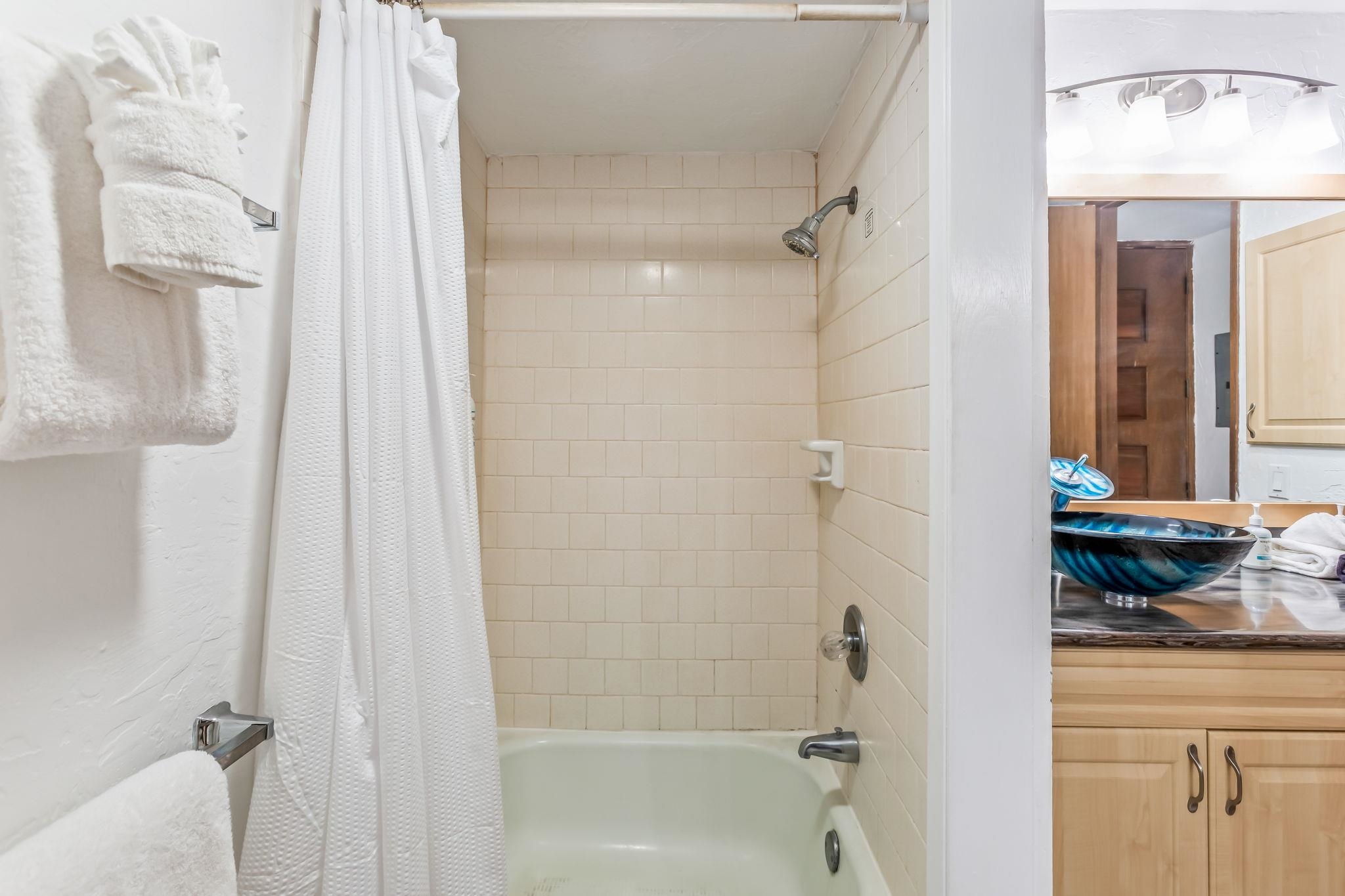 3543 Lower Honoapiilani Road, Unit C204 Lahaina, HI 96761 - Photo 22 of 28 a bathroom with a shower