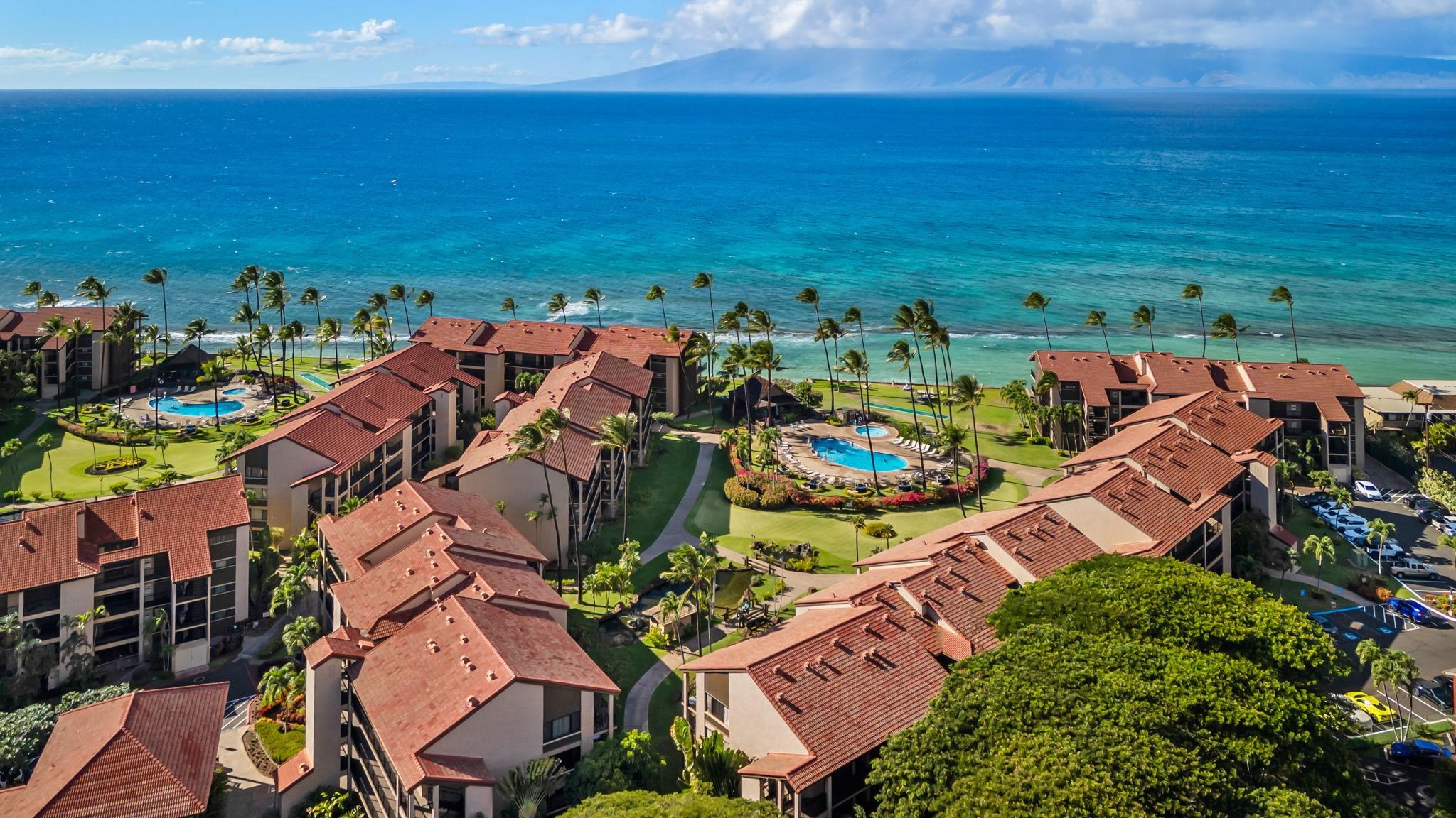 3543 Lower Honoapiilani Road, Unit C204 Lahaina, HI 96761 - Photo 25 of 28 an aerial view of multiple house