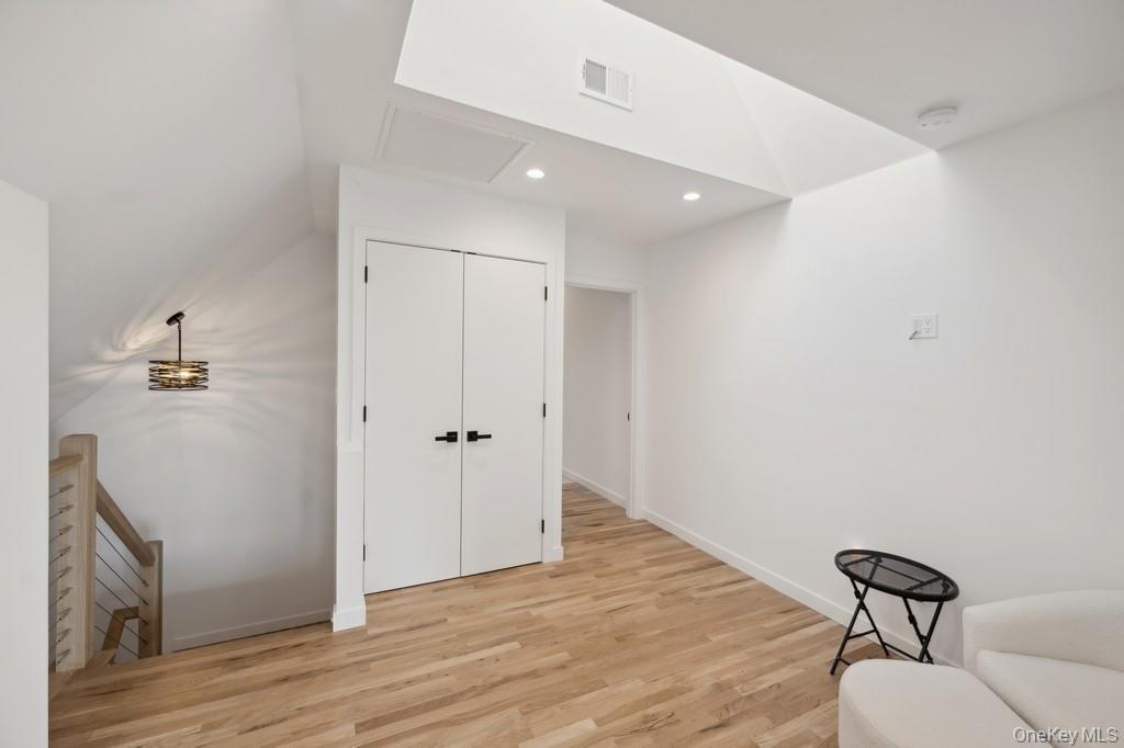 45 Ditch Plains Road Montauk, NY 11954 - Photo 15 of 19 a view of empty room with wooden floor