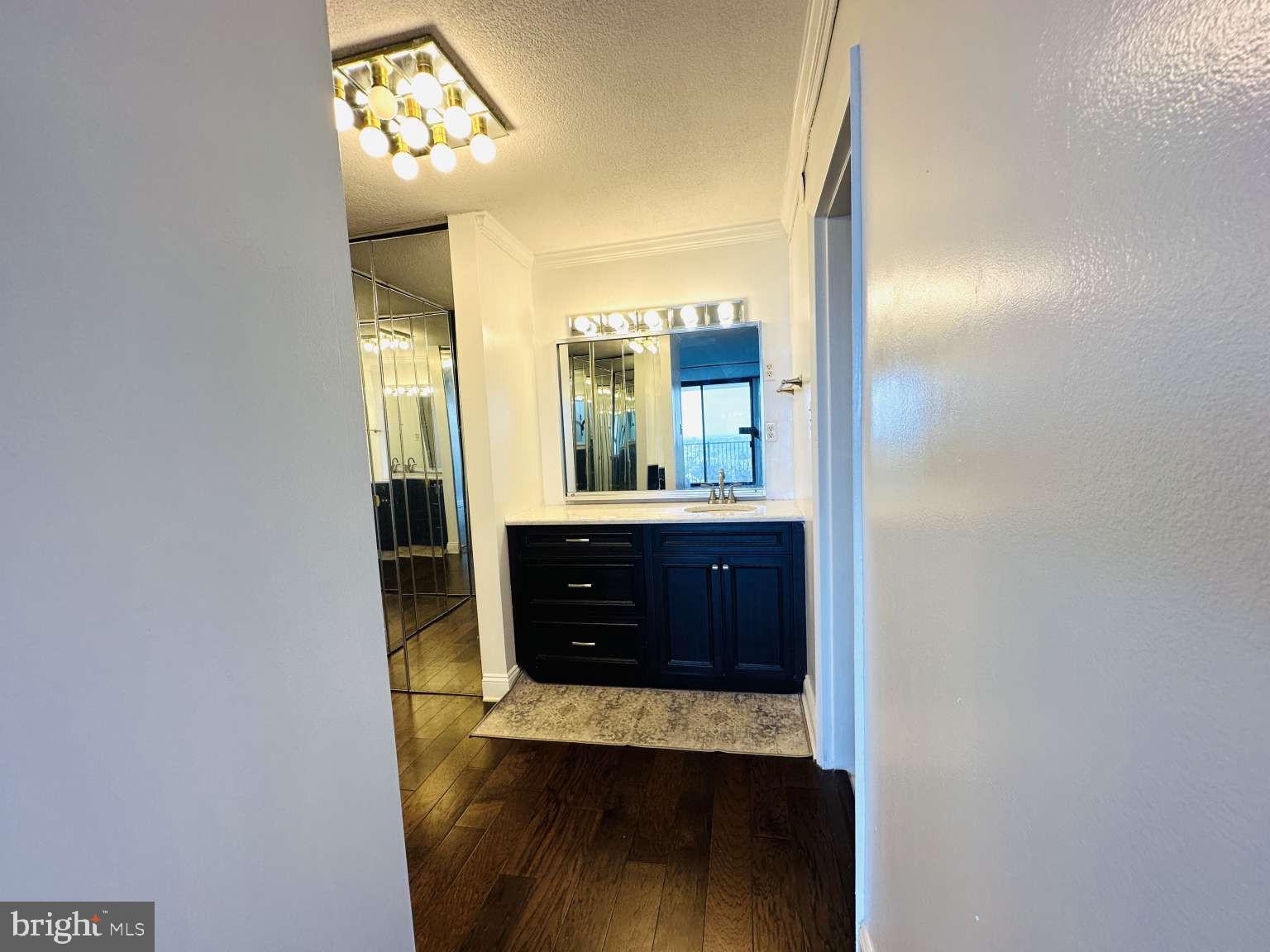 3900 West Ford Road, Unit 18K Philadelphia, PA 19131 - Photo 25 of 49 a bathroom with a sink and a mirror