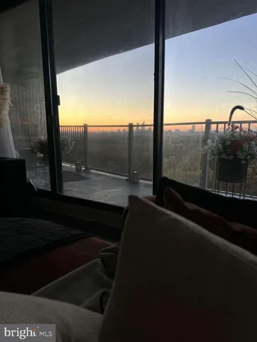 an aerial view of a house with a garden and yard