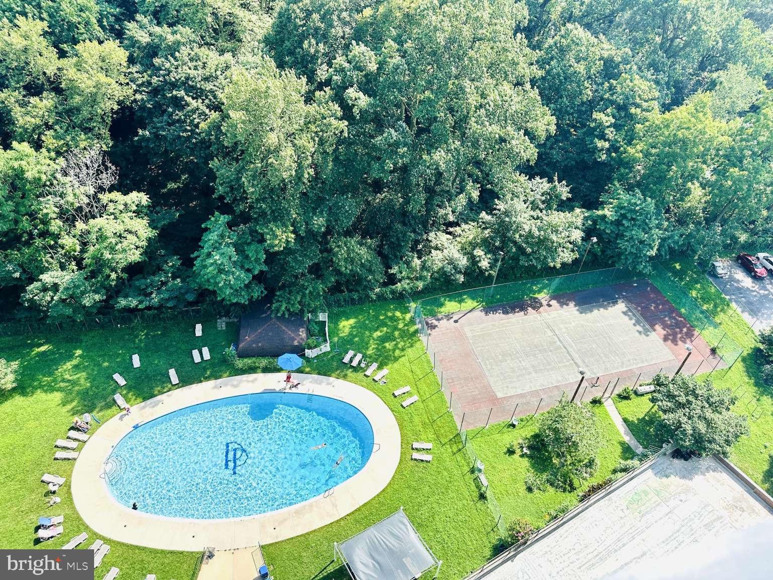 3900 West Ford Road, Unit 18K Philadelphia, PA 19131 - Photo 47 of 49 an aerial view of a house with a garden and yard