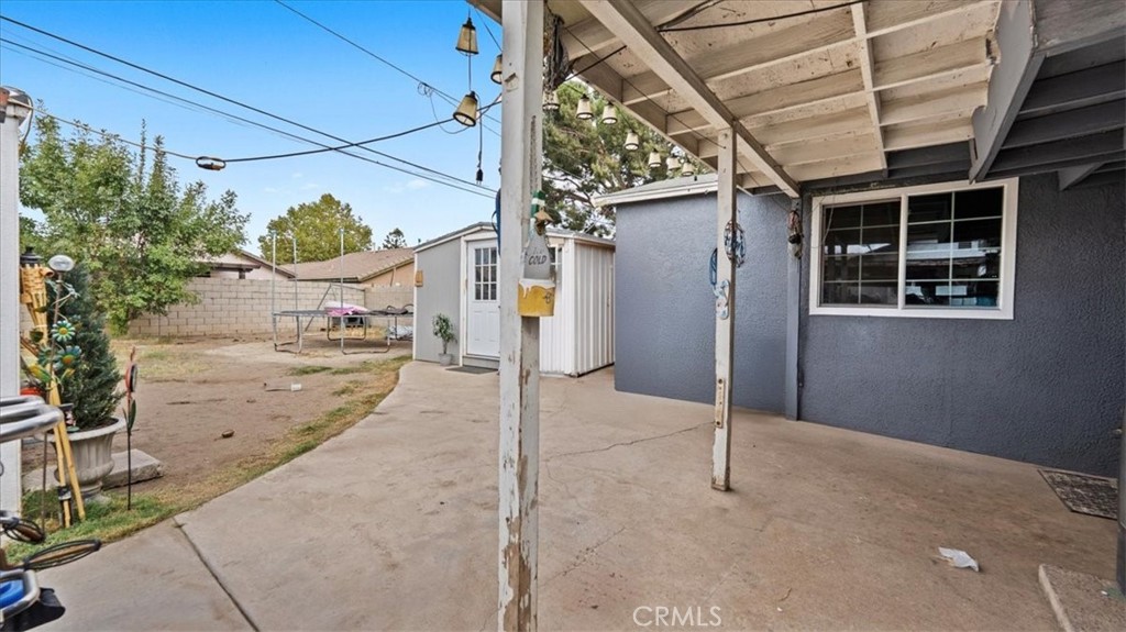 1030 North Western Avenue Colton, CA 92324 - Photo 21 of 32 a view of a street with a garage