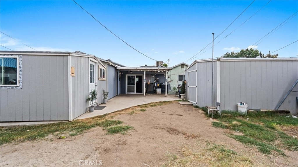 1030 North Western Avenue Colton, CA 92324 - Photo 24 of 32 a view of a house with backyard