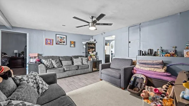 a living room with furniture and a rug