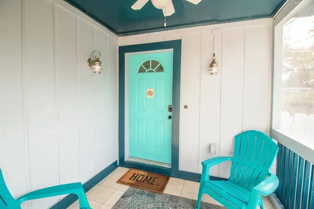 a room with furniture and a window