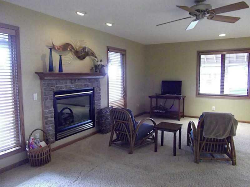 158 Scott Ridge Road Harmony, PA 16037 - Photo 13 of 25 a living room with furniture and a fireplace