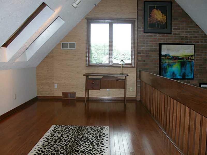 158 Scott Ridge Road Harmony, PA 16037 - Photo 19 of 25 a hallway with a bench and a rug