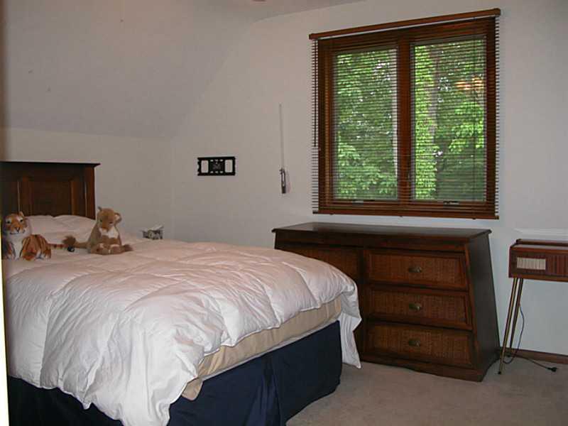 158 Scott Ridge Road Harmony, PA 16037 - Photo 20 of 25 a bedroom with a bed and a dresser