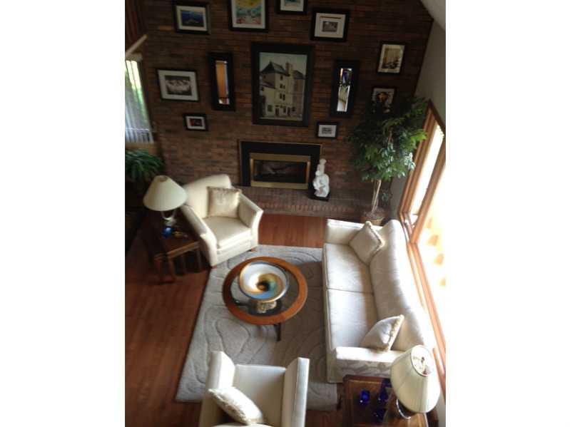 158 Scott Ridge Road Harmony, PA 16037 - Photo 6 of 25 a living room with furniture and a fireplace