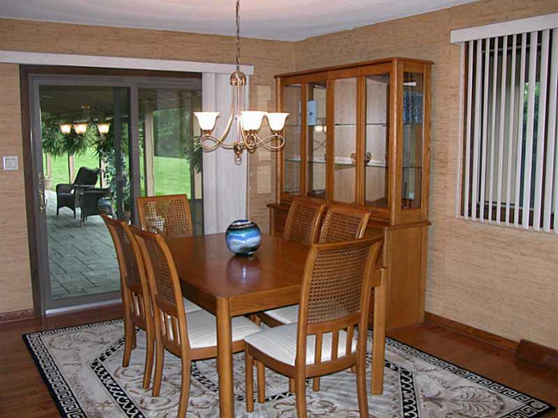 158 Scott Ridge Road Harmony, PA 16037 - Photo 7 of 25 a view of a dining room with furniture window and wooden floor