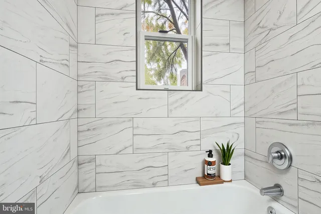 a bathroom with a bathtub