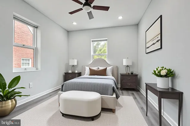 a bedroom with a bed and window