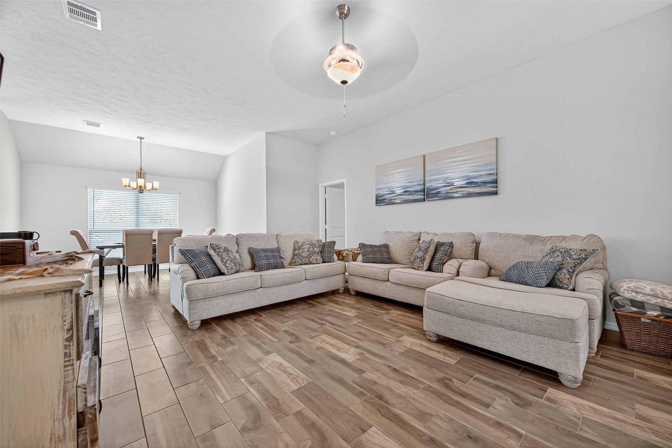 128 Red Deer Way Huntsville, TX 77320 - Photo 32 of 33 a living room with furniture and a wooden floor