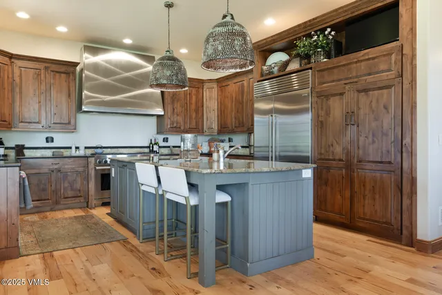 a living room with fireplace furniture and a flat screen tv