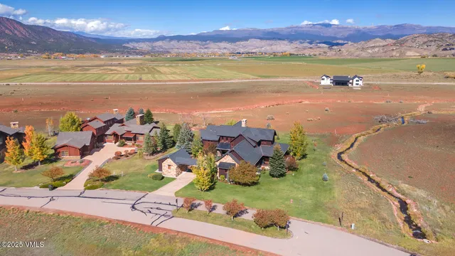 a view of an ocean and a mountain