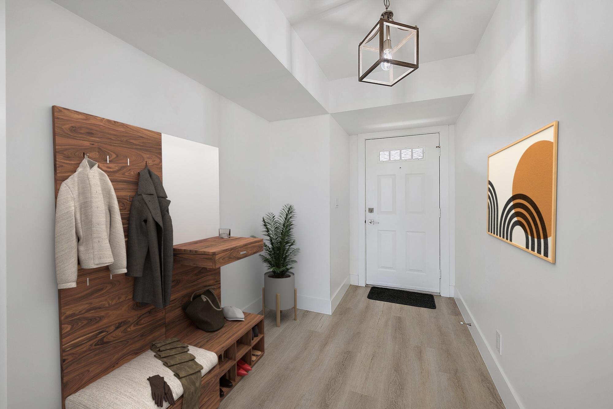 10459 Southeast Terrapin Place, Unit 101D Jupiter, FL 33469 - Photo 2 of 49 a view of entryway with workspace and mirror