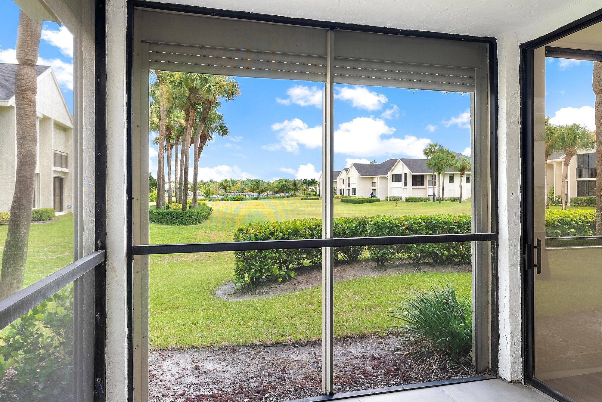 10459 Southeast Terrapin Place, Unit 101D Jupiter, FL 33469 - Photo 29 of 49 a view of a from a window