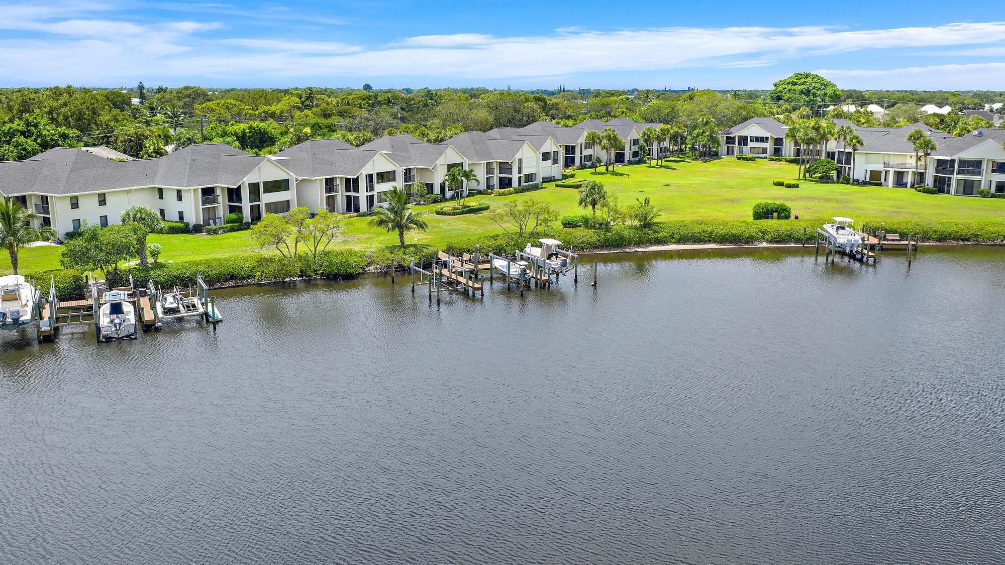 10459 Southeast Terrapin Place, Unit 101D Jupiter, FL 33469 - Photo 33 of 49 an aerial view of a house with outdoor space lake view and mountain view