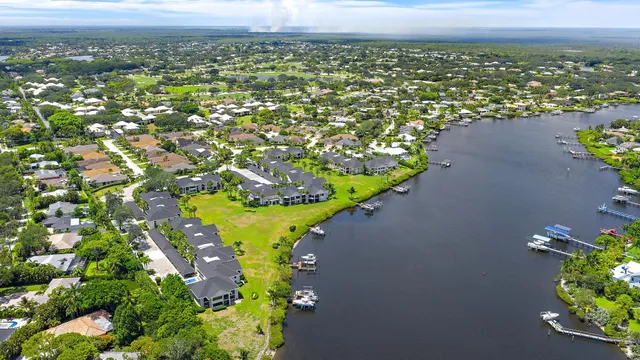a front view of a house with a big yard