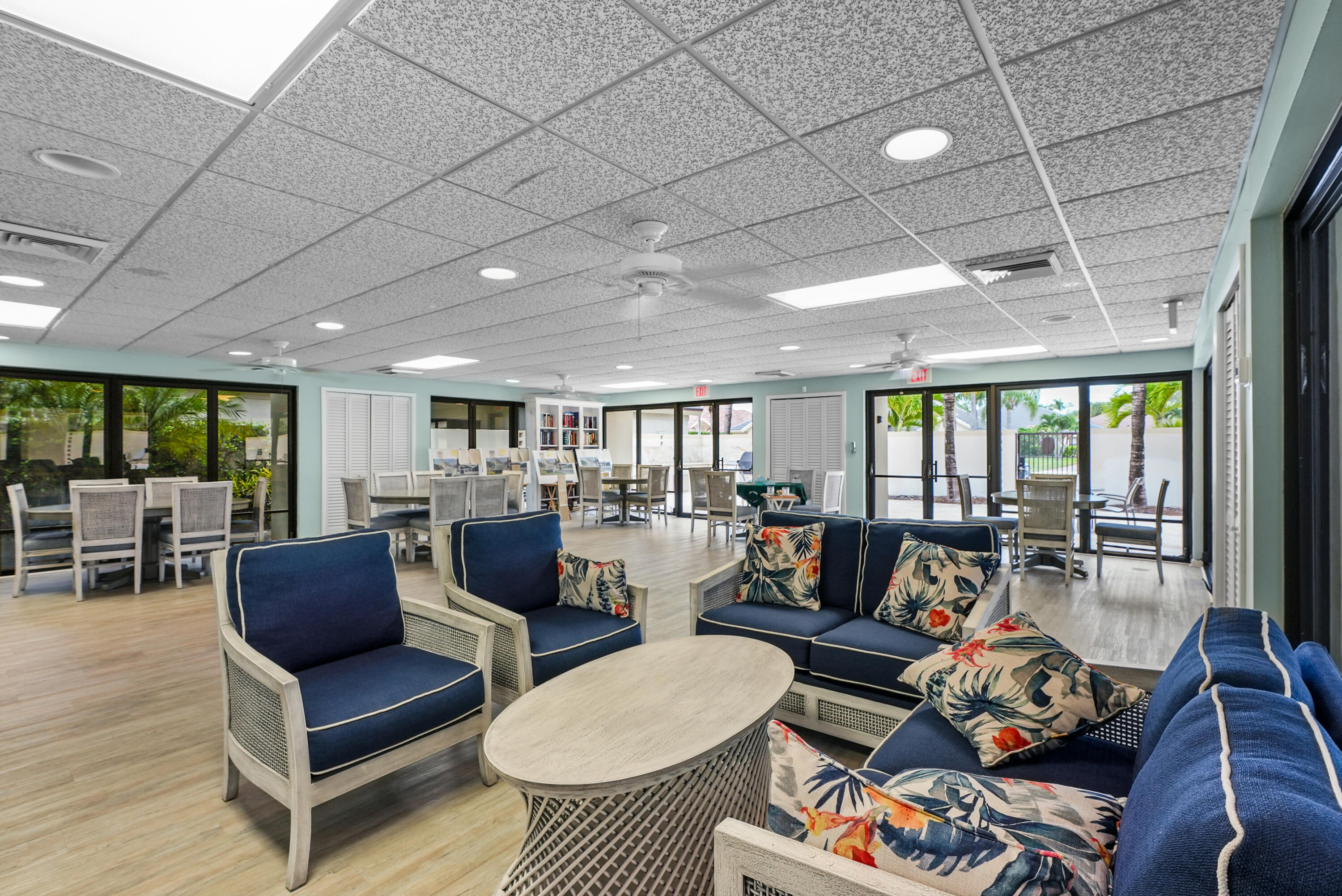 10459 Southeast Terrapin Place, Unit 101D Jupiter, FL 33469 - Photo 42 of 49 a living room with furniture and a large window