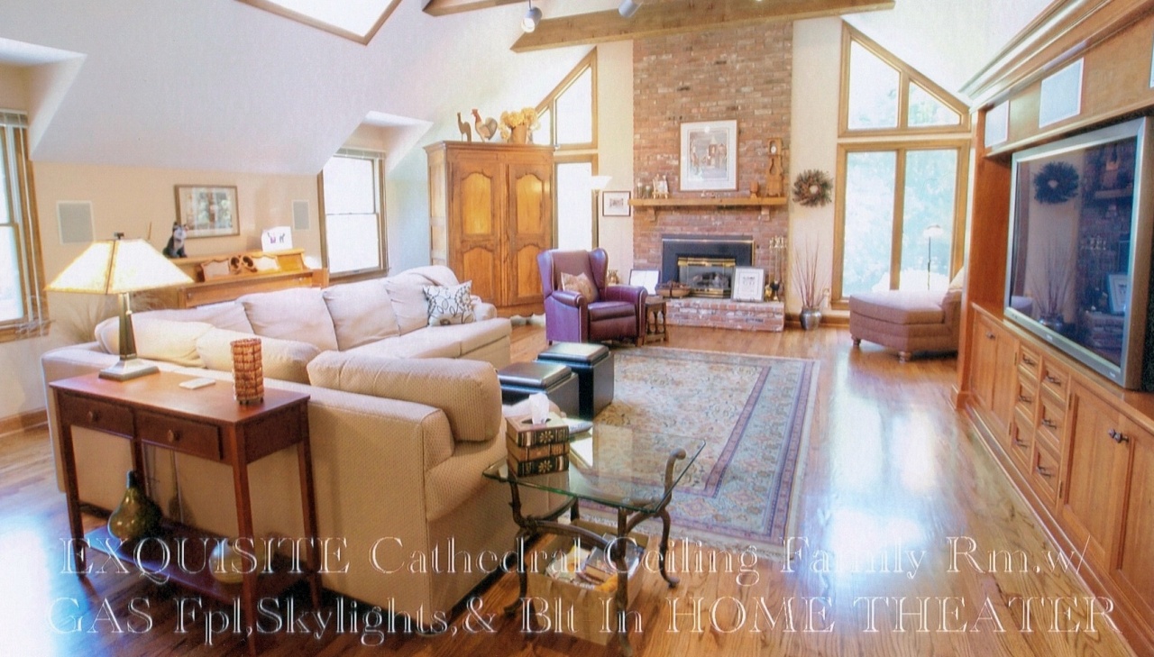 43 Signal Hill Road Wilton, CT 06897 - Photo 9 of 25 a living room with furniture fireplace and flat screen tv