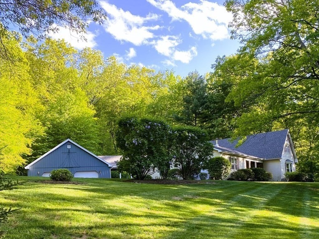 76 Main Road Gill, MA 01354 - Photo 1 of 36 a view of a house with a yard