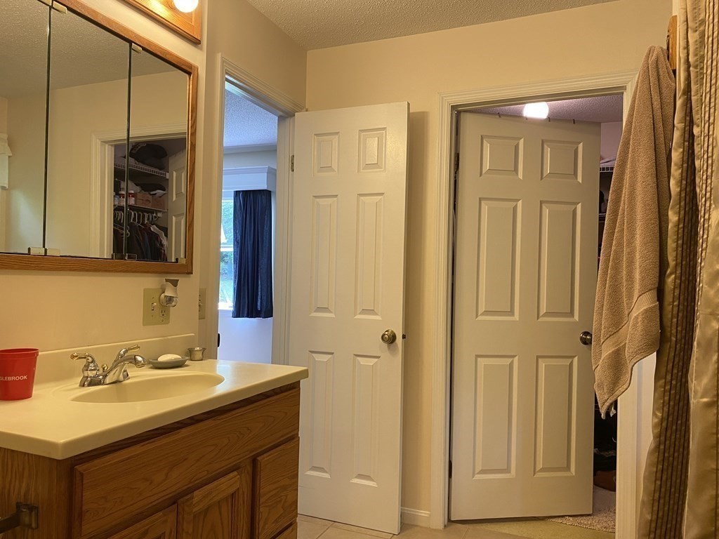 76 Main Road Gill, MA 01354 - Photo 18 of 36 a bathroom with a sink and a mirror