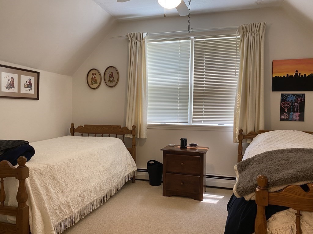 76 Main Road Gill, MA 01354 - Photo 25 of 36 a bedroom with a bed and a window