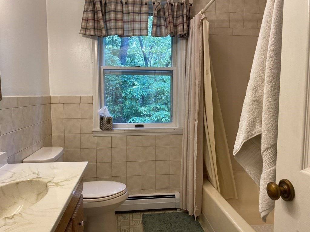 76 Main Road Gill, MA 01354 - Photo 30 of 36 a bathroom with a sink toilet and shower