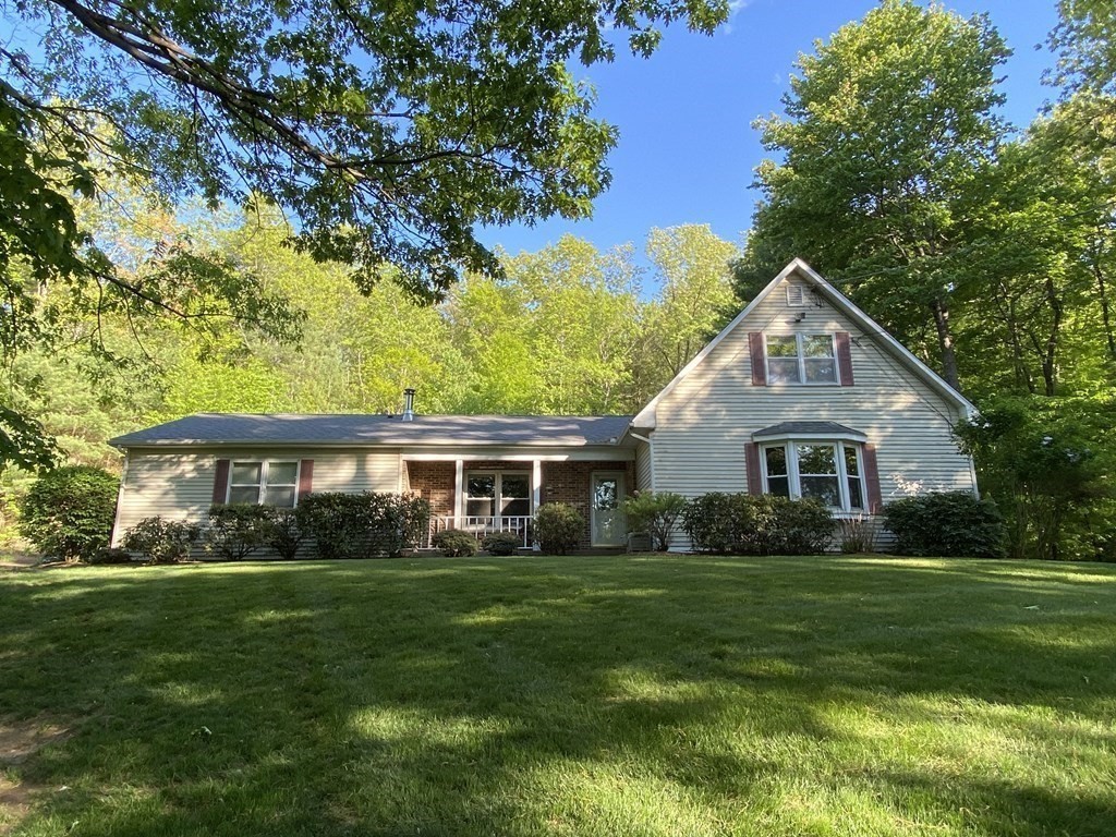 76 Main Road Gill, MA 01354 - Photo 3 of 36 a front view of house with yard and green space